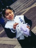 A young Bashy community member at a past event